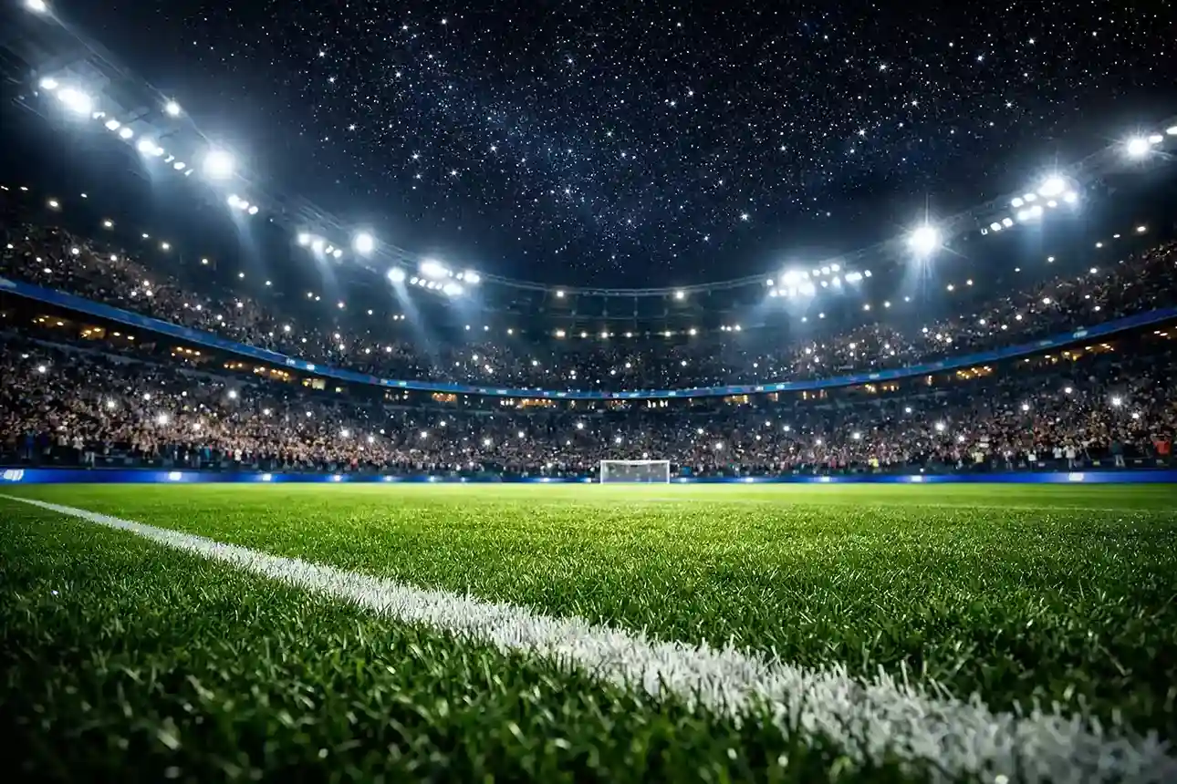 Grand stade européen illuminé de nuit pour un match de Ligue des Champions avec un terrain impeccable